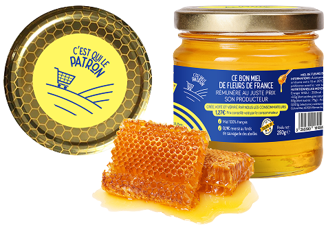 Pot de miel avec étiquette jaune et bleue